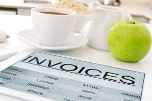 Image of an Invoice on a breakfast table